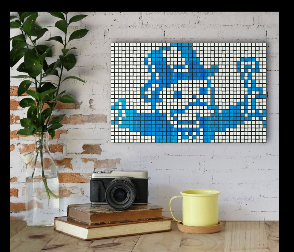 Blue-and-white pixel artwork displayed on a brick wall